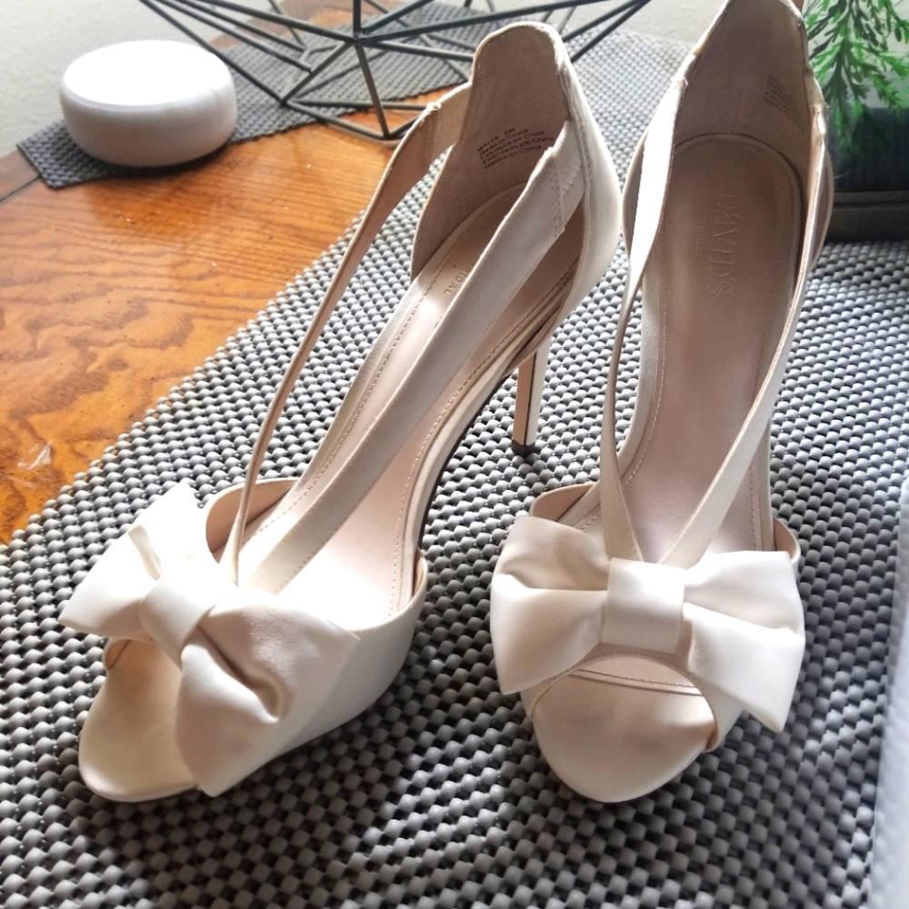 Ivory bow heels